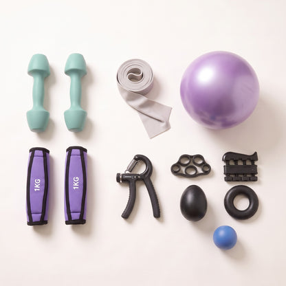 The Strength Kit grouped by job: the weights together on the left, the resistance band and mini exercise ball in the centre, and the grip strength tools on the right.