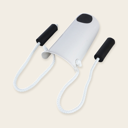 The Sock Aid shell at an angle with both cords looped out and a foam handle on each