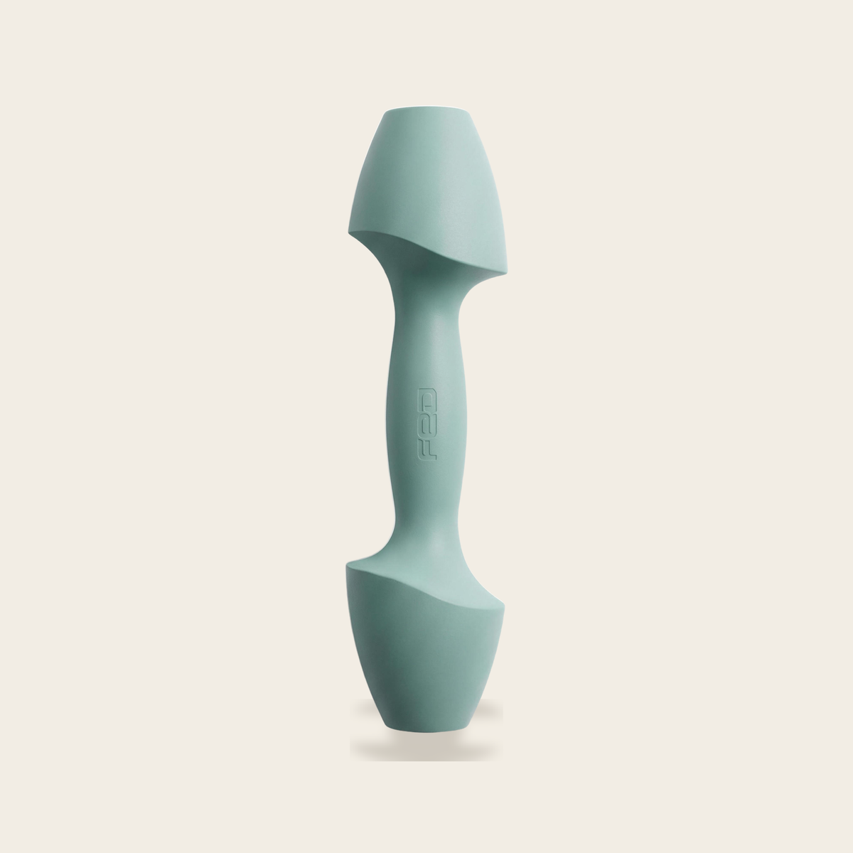 The Sculpt Dumbbell in azure on a cream background