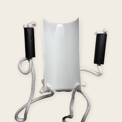 Inside of the Sock Aid's curved plastic shell, where the sock goes, with a foam handle and cord on each side