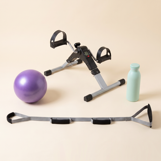 Three-quarter view of the Knee Replacement Ready Kit with the pedal exerciser, exercise ball, water bottle and leg lifter strap.