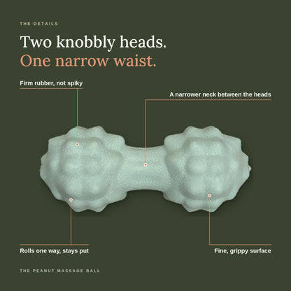 The Peanut Massage Ball up close: two knobbly heads and a narrow waist in firm rubber